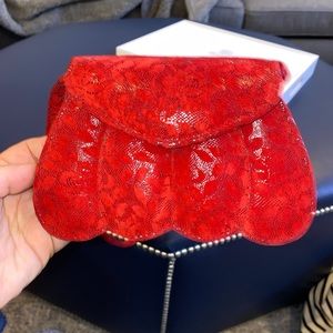 Michelle LaLonde red suede bag